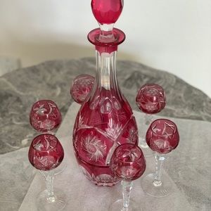 Vintage Imperlux cranberry colored crystal decanter with 6 Cordial glasses.